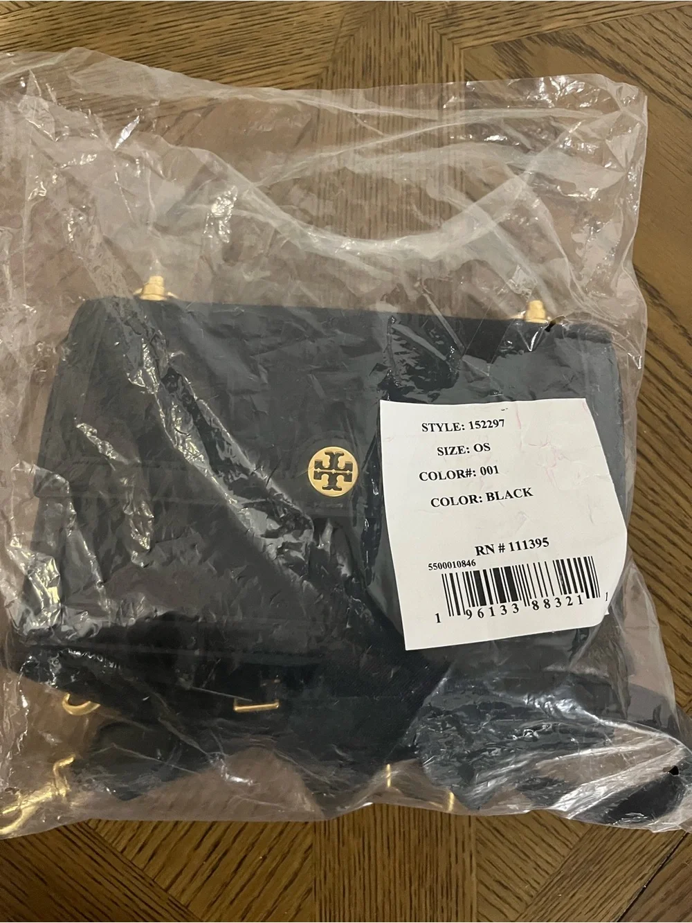 Tory Burch Black Leather Messenger Bag with Gold Logo bought from MI mall